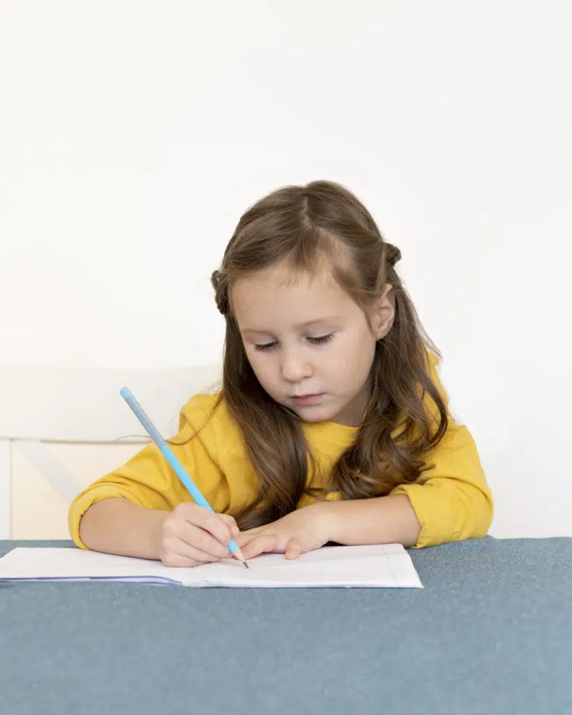 Homework help: little girl doing her homework 