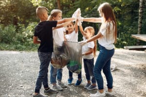 Environment: a group of children recycling waste