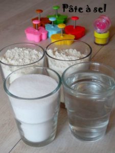 Child's activity: two glasses of flour, one glass of water, one glass of salt