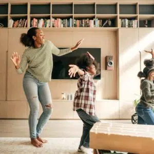 A nanny who dances with the children during after-school care