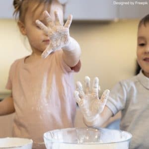 Children playing with flour
