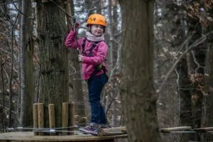 A girl doing a tree climbing
