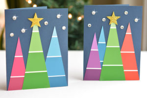 a greeting card with 3 trees